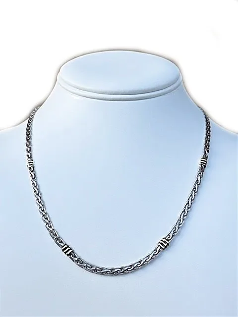 Solid 18kt gold and sterling silver braided necklace