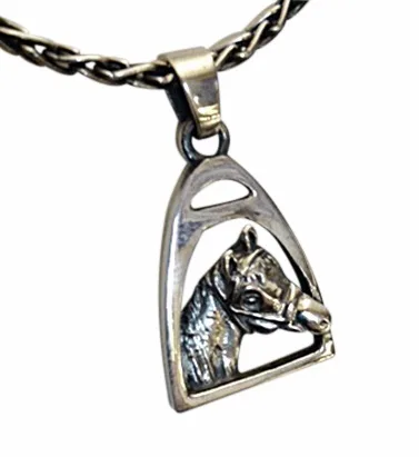 Horse jewelry - sterling horse head and iron riding stirrup.