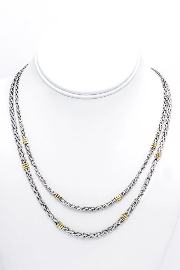 Silver braided necklace 18KT gold and sterling silver.