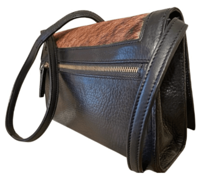 Brown hair on hide crossbody bag from Argentina.