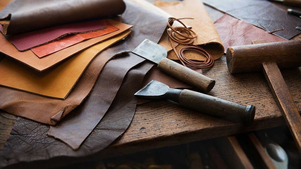 Genuine Argentine leather samples on work bency.