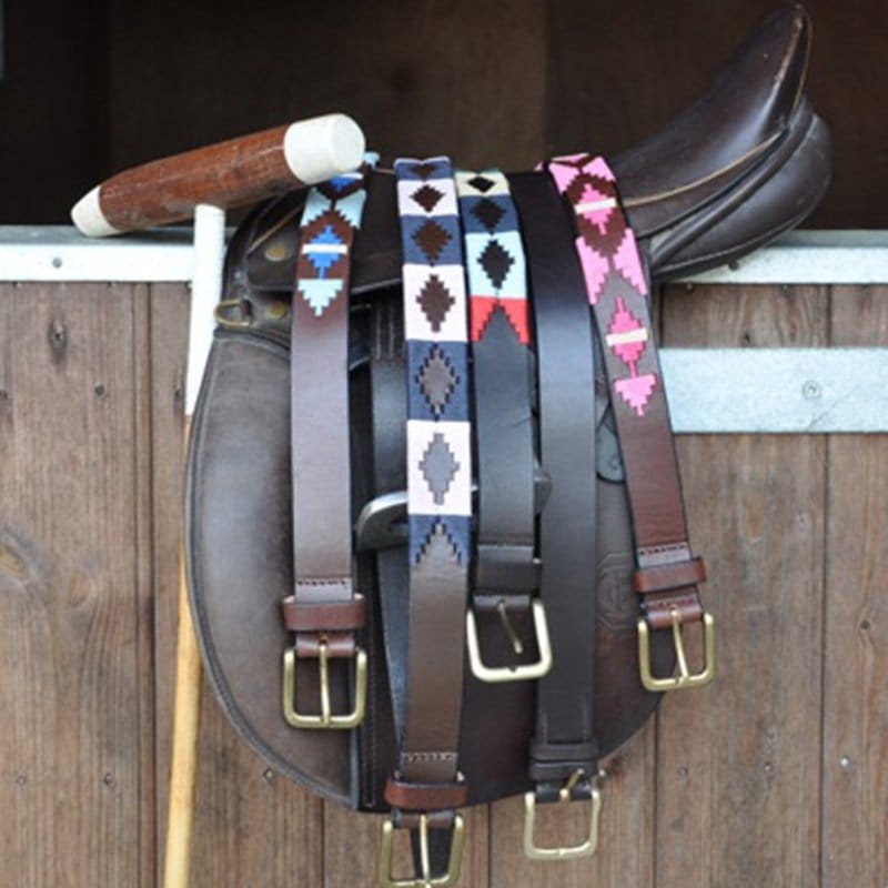 polo belts on a saddle