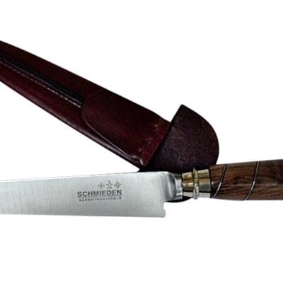 Walnut with alpaca silver accents handle gaucho knife.