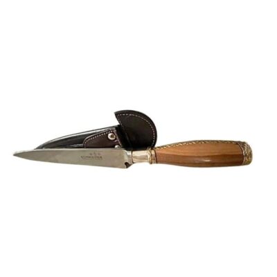 Exotic hardwood with ornate brass detailing gaucho cuchillo knife.