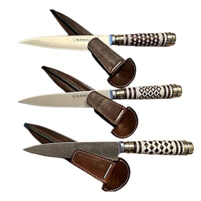 Argentinian gaucho fixed blade knife showing 3 different styles of braided handle.