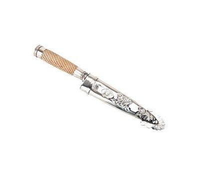 Braided tientos with alpaca silver picasso style scarab gaucho knife.