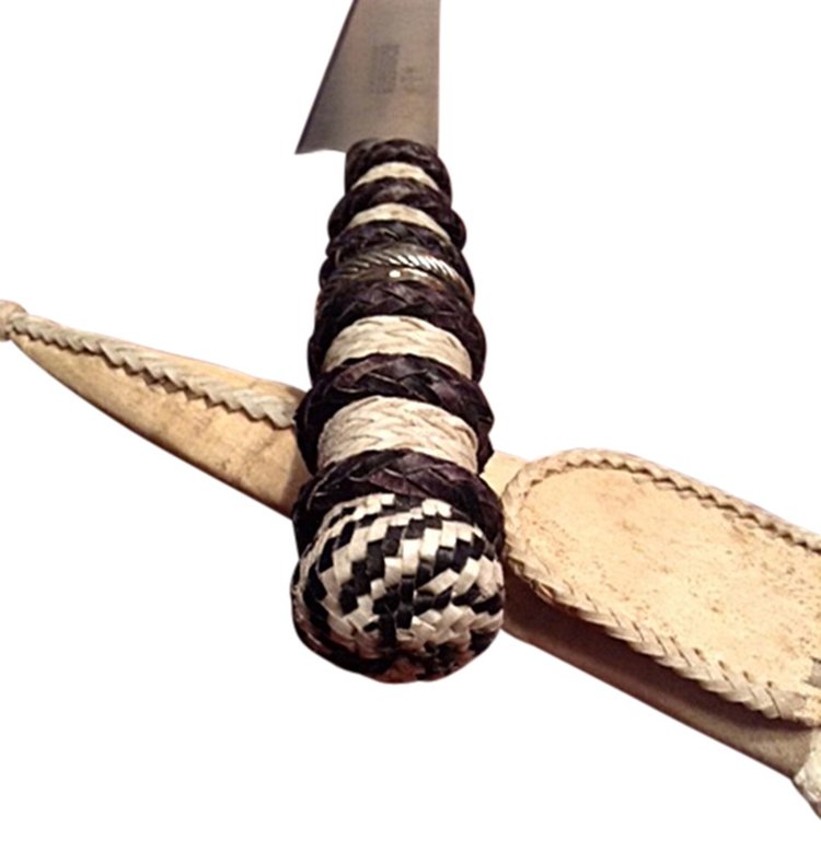 Hand-braided leather gaucho knife handle.