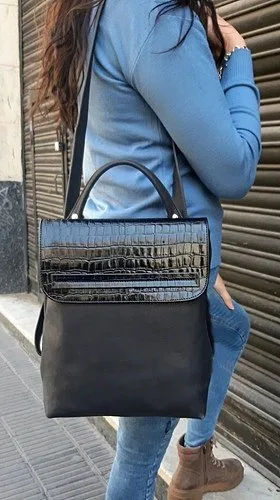 small backpack with a shoulder stripe