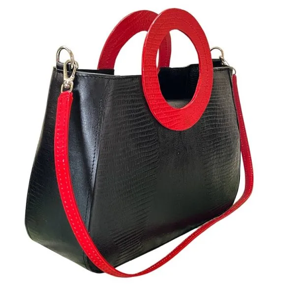 luxurious and exclusive black snake embossed cow leather handbag with a shoulder strap