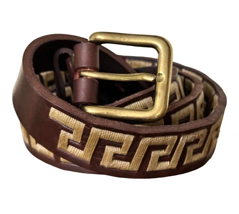 Brown leather belt with intricate hand-stitched embroidery.