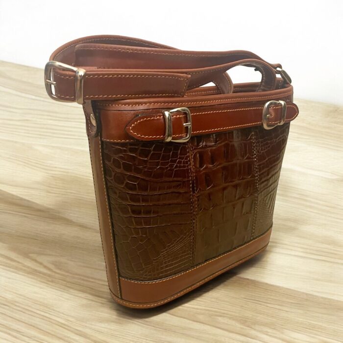 Brown croc-embossed cowhide leather handbag, elegant and sophisticated design.