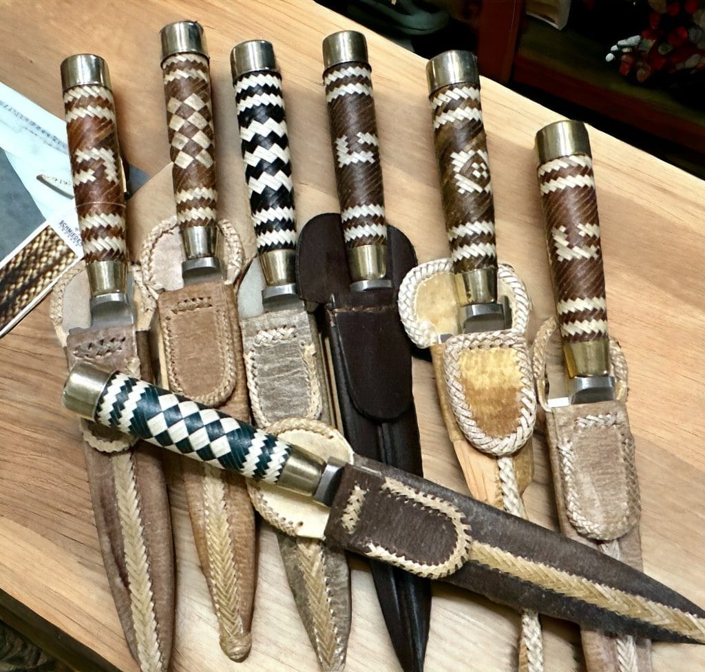 Collection of Gaucho knives with sheaths.