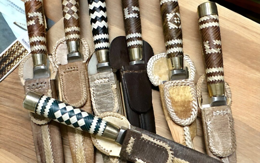 Collection of Gaucho knives with sheaths.