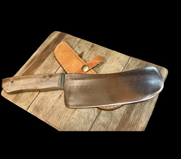 Flat faced butcher knife.