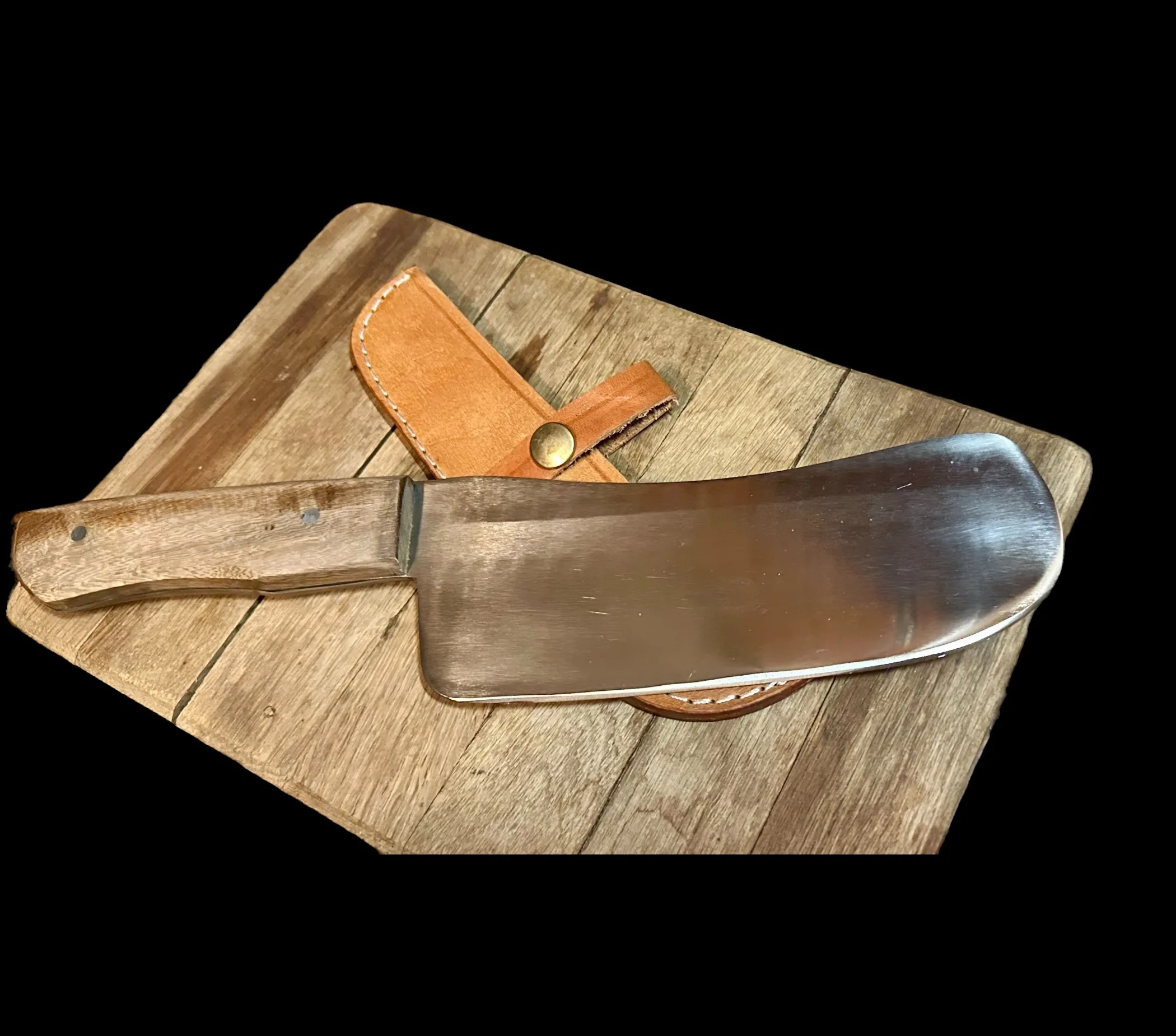 Flat faced butcher knife.