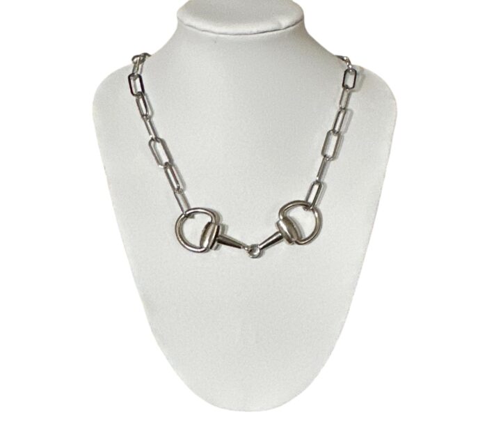 An equestrian necklace.