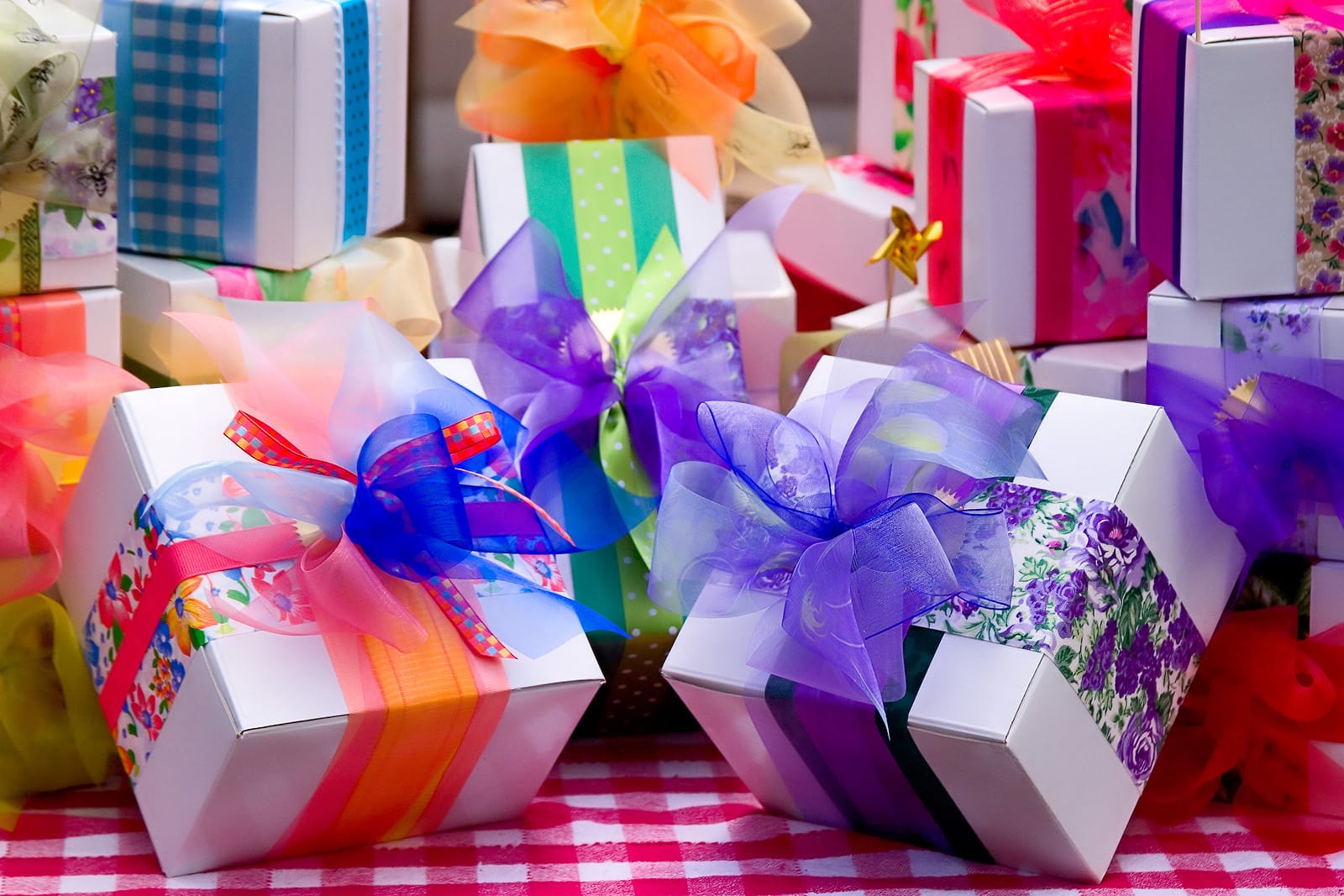 Wrapped gifts with colorful bows.