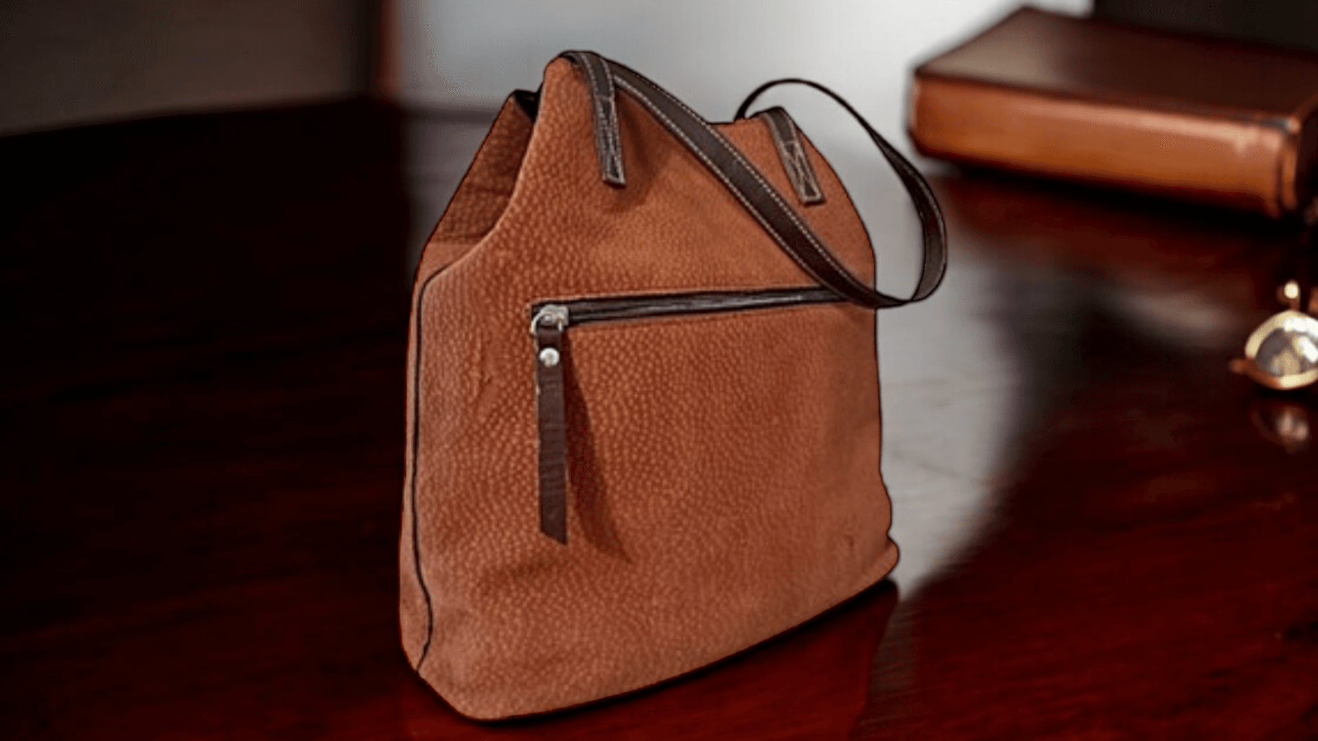 A close-up of an exclusive capybara leather tote bag, featuring classic craftsmanship, rich texture, and elegant design with old money vibes, perfect for elevating any sophisticated outfit.