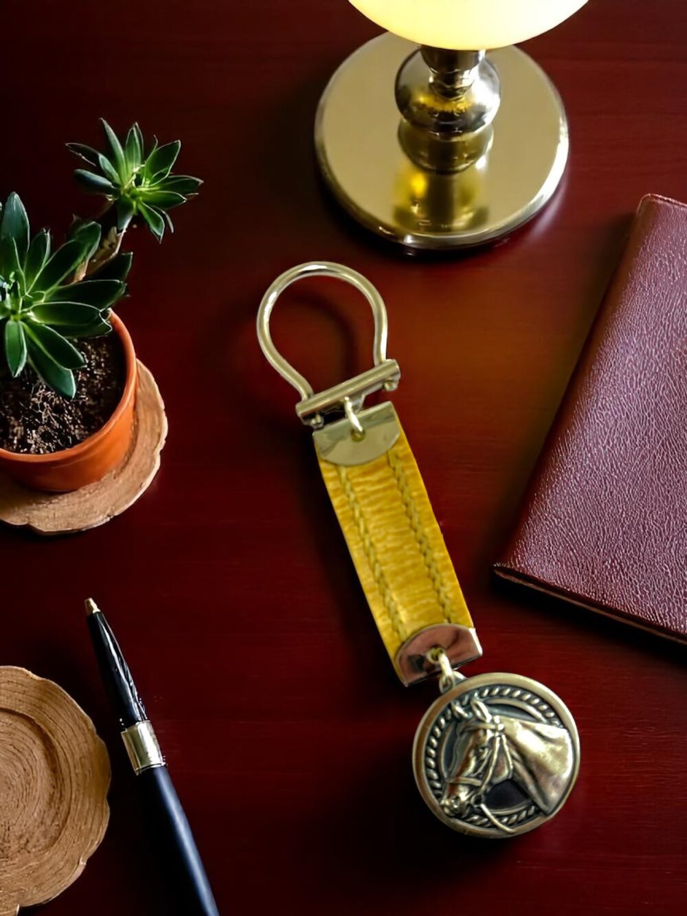 Close-up of a sterling silver horse pendant featuring gaucho-style craftsmanship