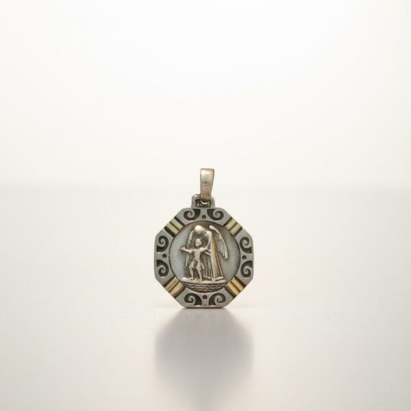 Saint Michael medallion in sterling silver with gold accents close-up Name: saint-michael-medallion-product