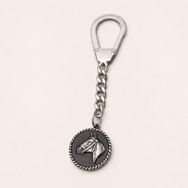 Patina horse head keychain handmade in Argentina in alpaca silver
