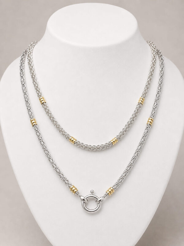 Two Byzantine sterling silver chains with 18kt gold accents, shown with different clasp styles.