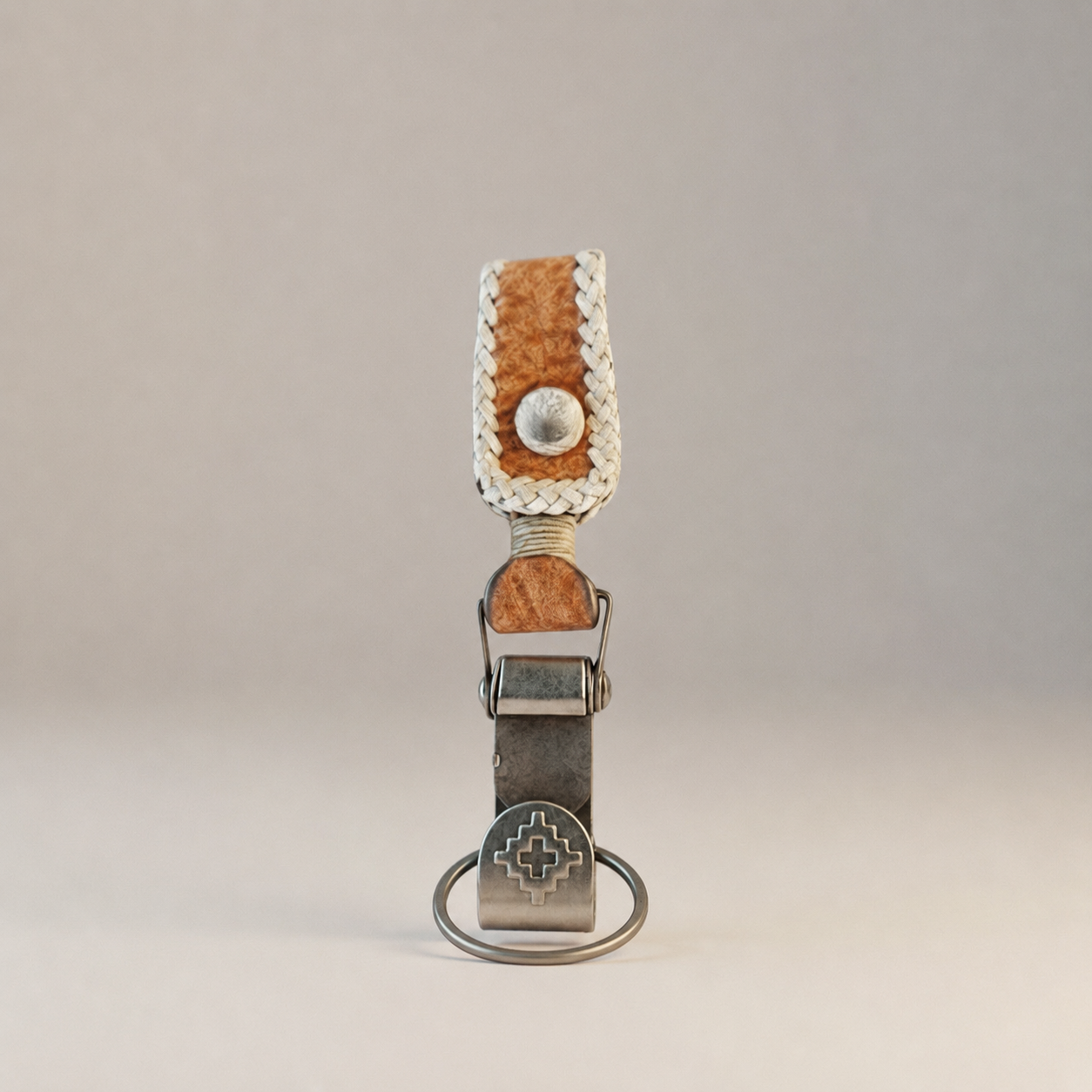 Argentine capybara leather keychain featuring traditional Guarda Pampa pattern and brass hardware