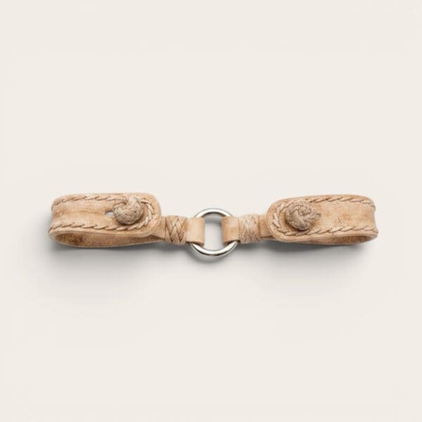 Alt text: Handmade rawhide double key holder from Argentina