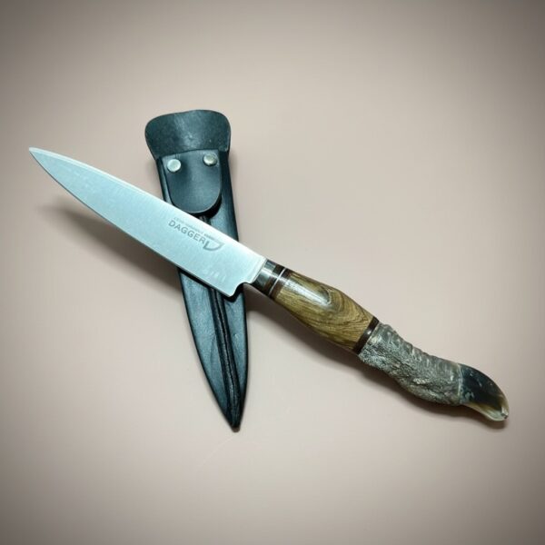 Handmade gaucho knife with rhea toe handle crossed over chocolate brown leather sheath