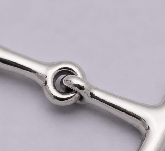 Close-up of the articulated center joint on the heavy chrome D-ring snaffle keychain.