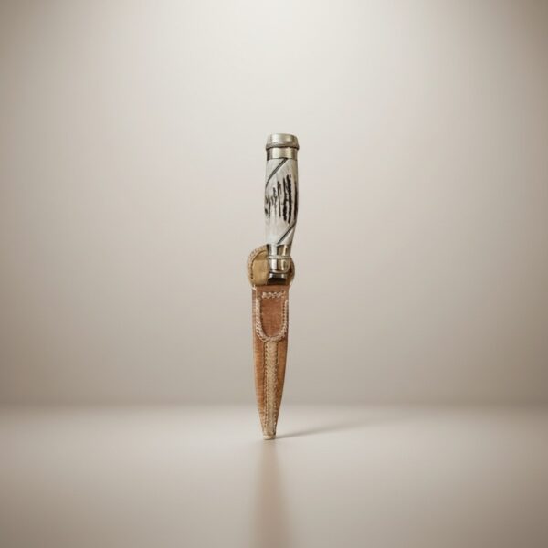 Handmade gaucho knife with polished natural antler handle and rawhide leather sheath