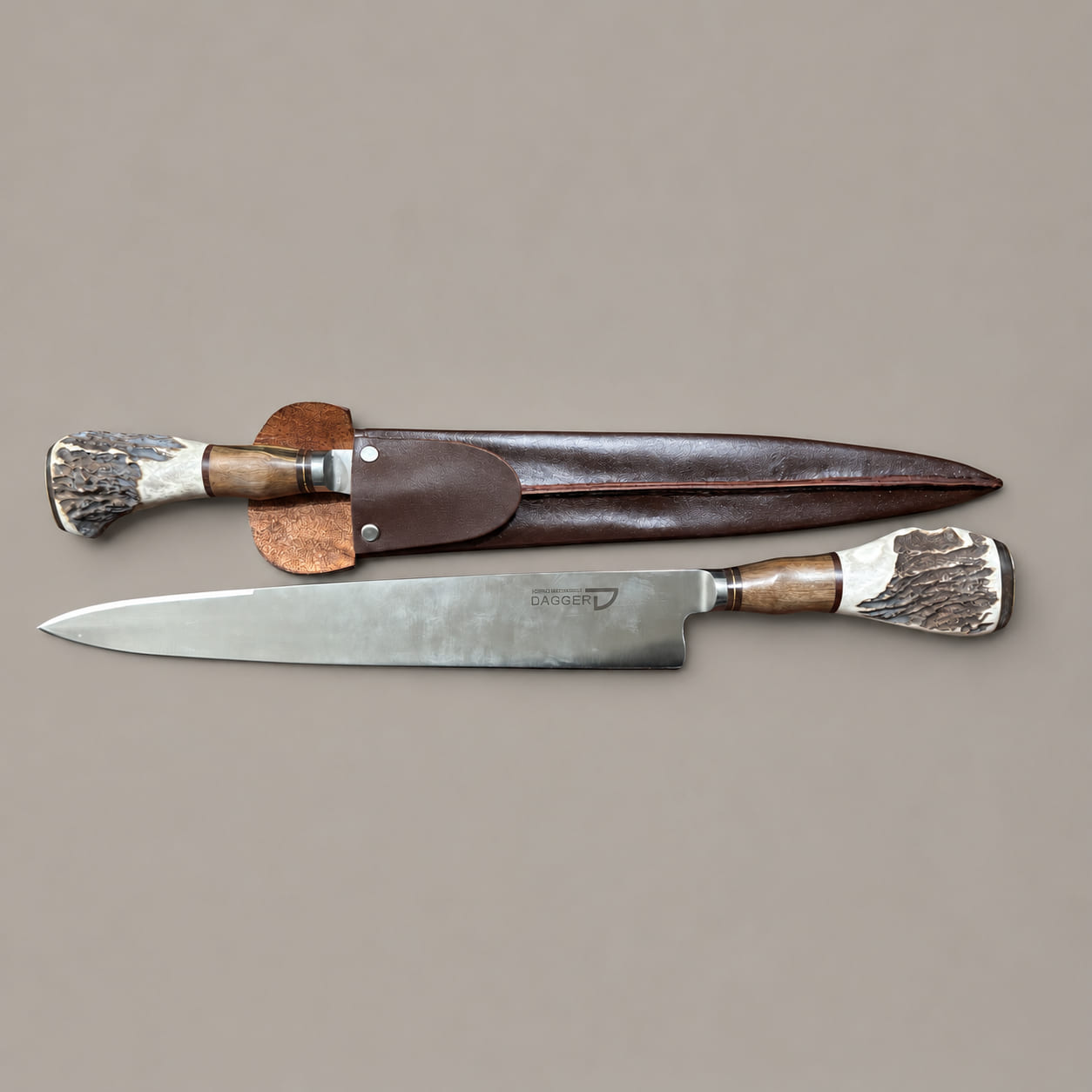 Two staghorn and hardwood gaucho knives in opposite directions, one with its steel blade exposed and the other inside a chocolate leather sheath.
