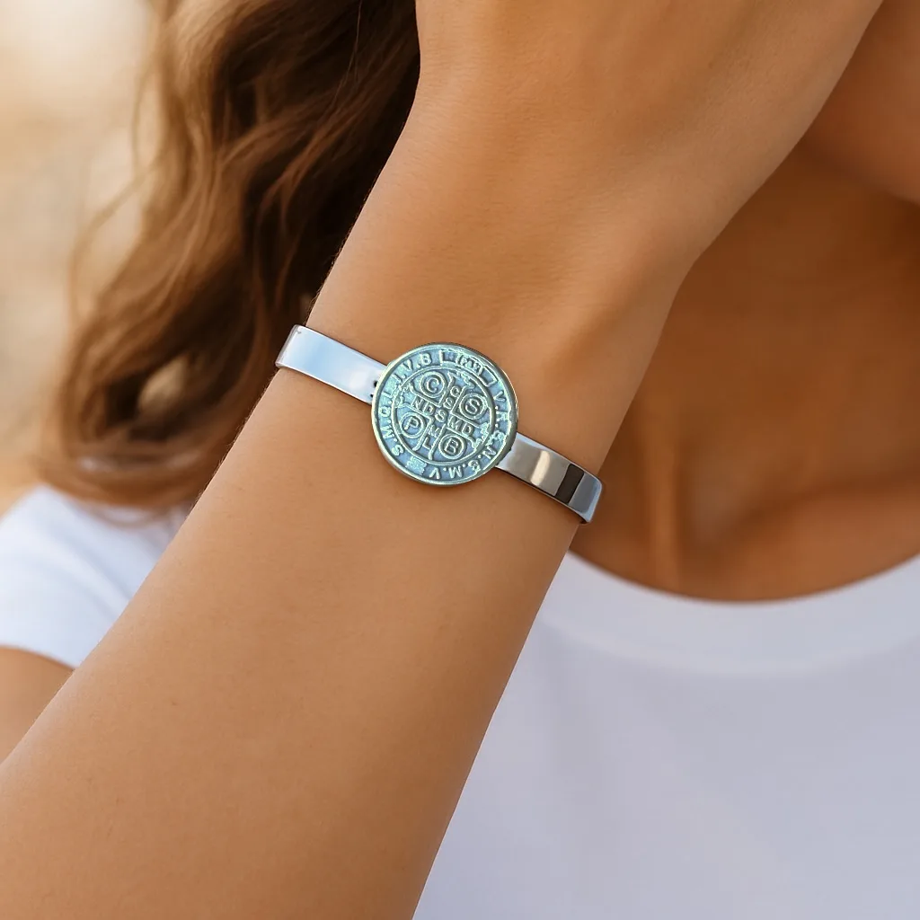 Saint Benedict Bracelet in silver-plated alpaca worn on wrist.