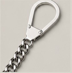Close-up of alpaca silver keychain lever clasp and polished chain
