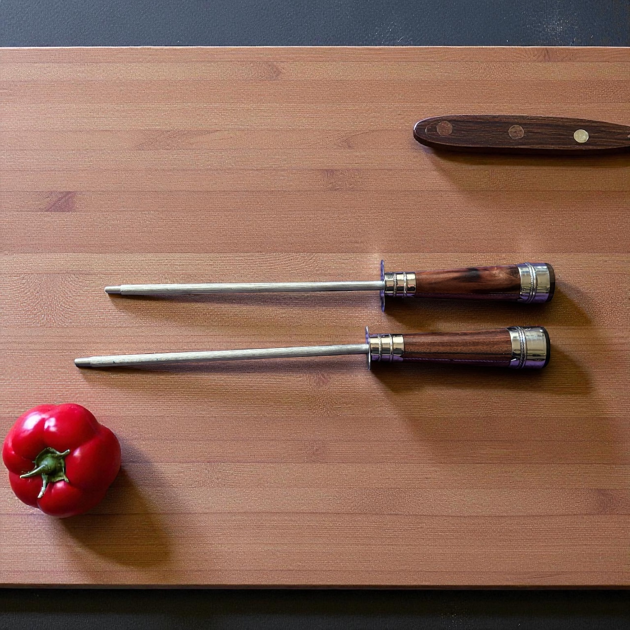 Traditional Argentine sharpening steel with alpaca and wood handle.