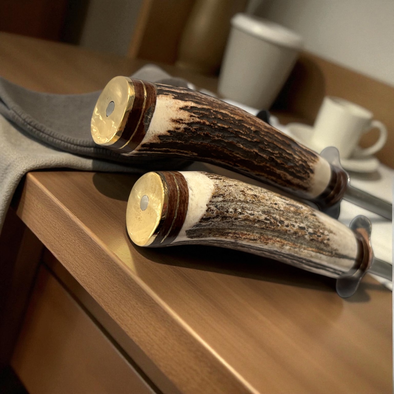 Close-up of genuine staghorn handle and brass details.