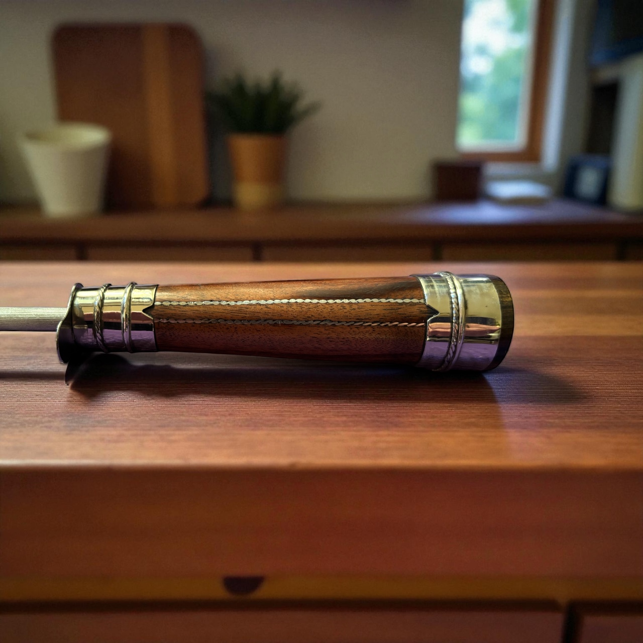 Close-up of alpaca detailing on Anchico wood handle. 20 cm stainless steel rod for sharpening long blades.