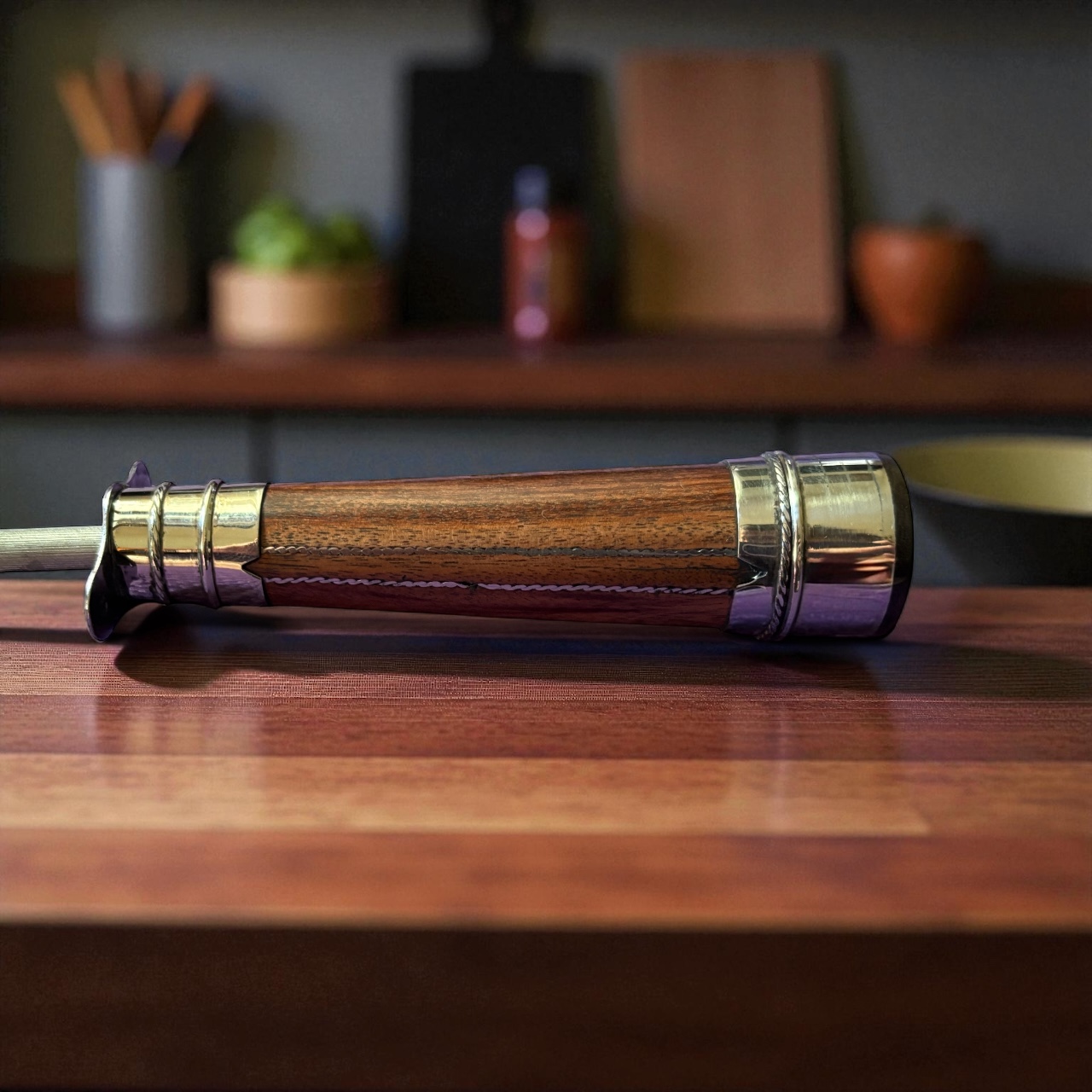 Close-up of alpaca detailing on Anchico wood handle. 20 cm stainless steel rod for sharpening long blades.