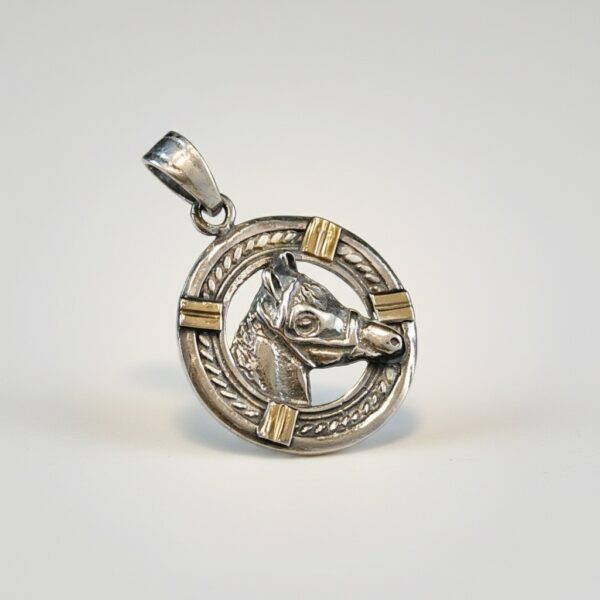 Horse head pendant sterling silver with gold accents angled view